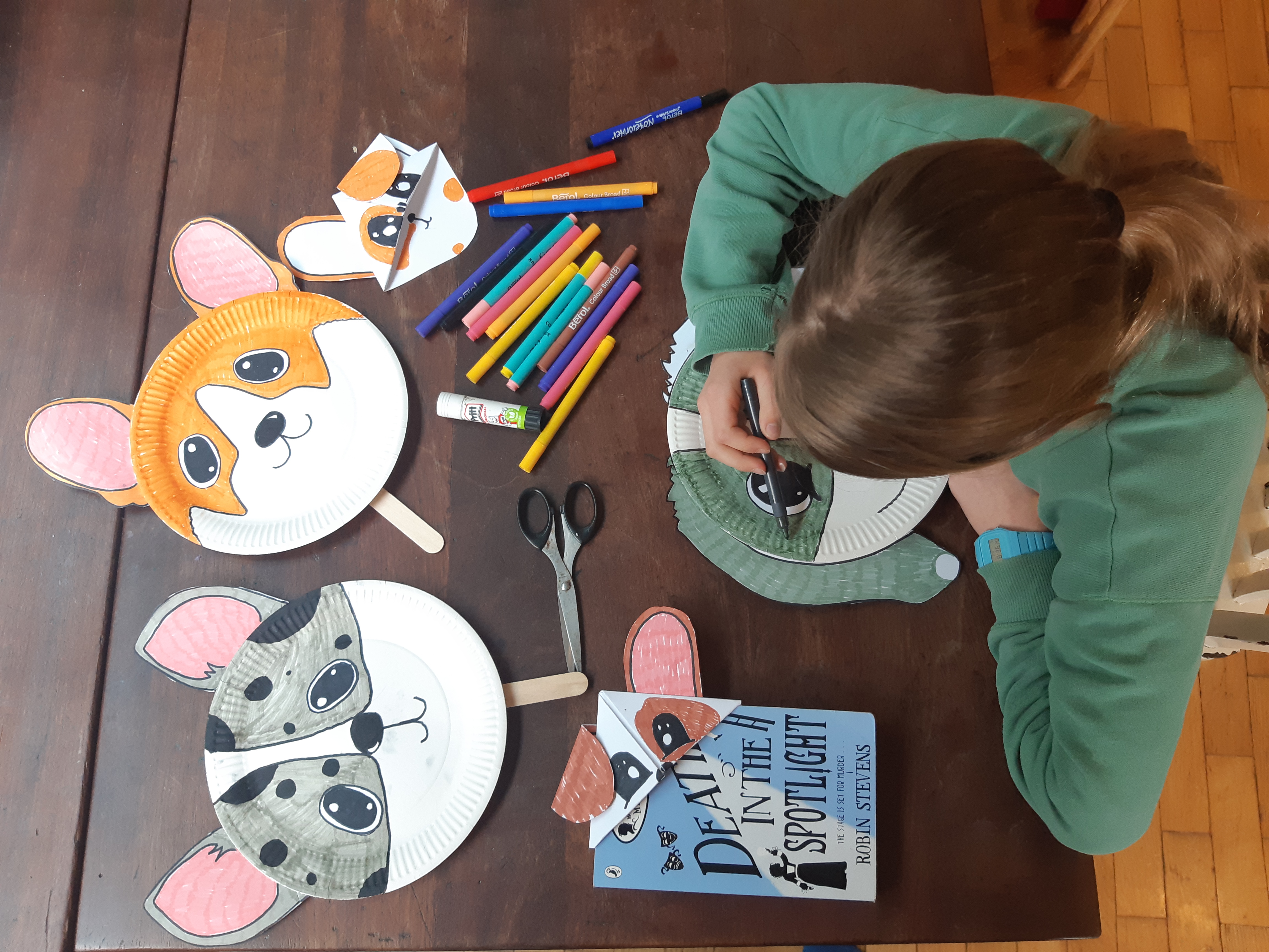 A child taking part in some animal themed crafts