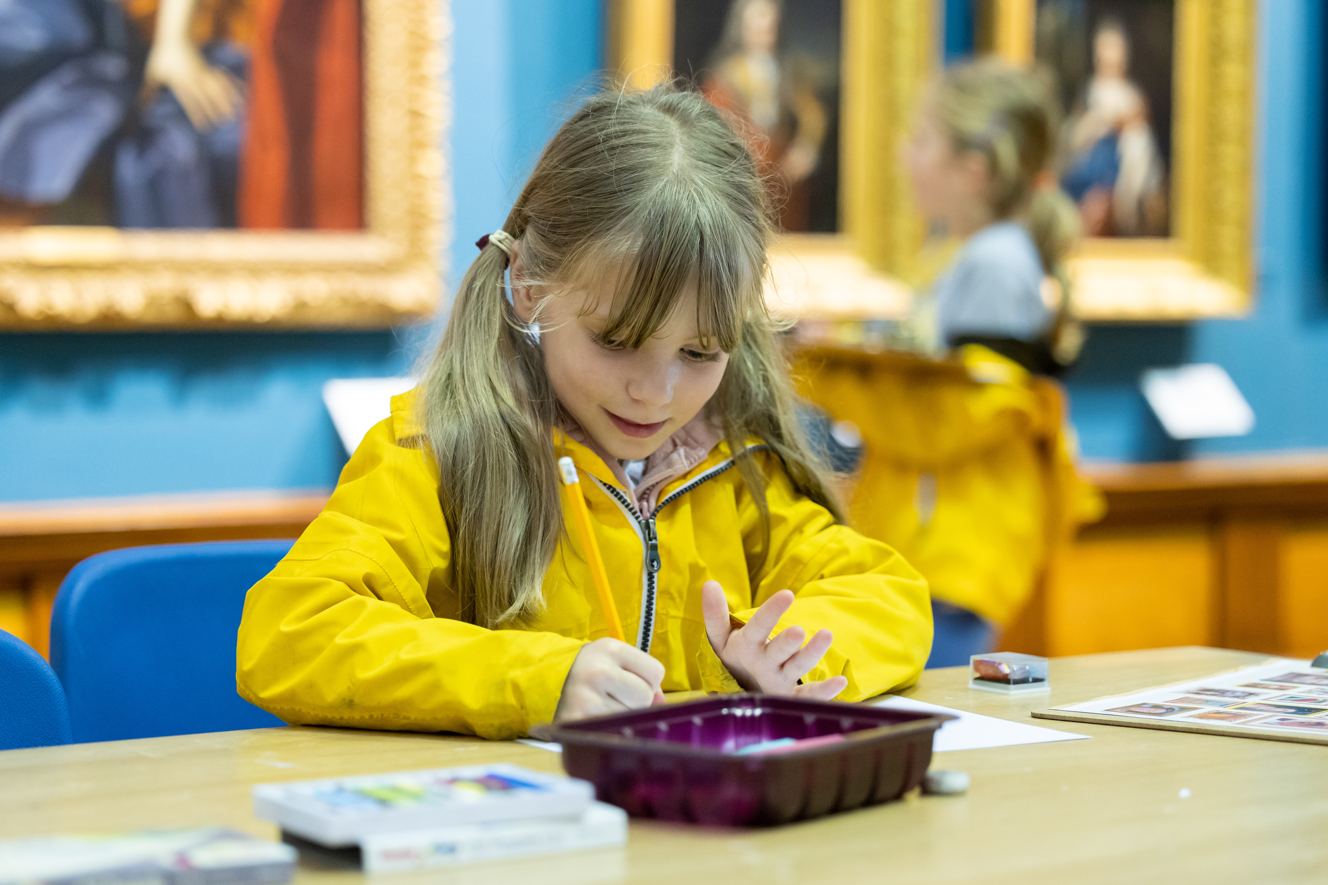 A child taking part in a craft activity