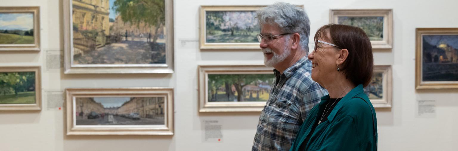 Image: Visitors viewing a temporary exhibition