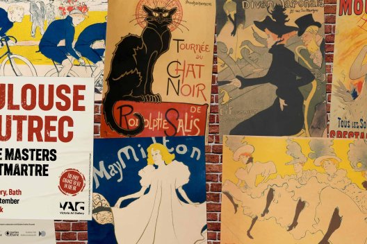 artwork for Toulouse Lautrec showing a brick wall decorated with posters